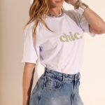 Shorts saia botão laranja